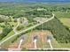 Aerial view of new home construction on acreage in a wooded area at 715 Colvin Dr, Locust Grove, GA 30248