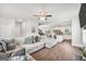 Inviting open floor plan seamlessly connects the living room, dining area, and modern kitchen at 715 Colvin Dr, Locust Grove, GA 30248