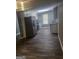 Well-equipped kitchen with stainless steel appliances, granite countertops, and ample cabinet space at 324 Cynthia Ct, Jonesboro, GA 30238