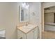 Bathroom vanity with a sink, mirror, and storage, offering a practical space at 126 Usher Ln, Covington, GA 30016