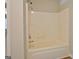 Standard tub shower combination with chrome fixtures at 126 Usher Ln, Covington, GA 30016