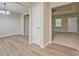 Spacious living area boasts updated flooring and neutral paint at 126 Usher Ln, Covington, GA 30016