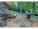 Backyard patio area with barbeque grill and outdoor seating at 3449 Archwood Dr, Doraville, GA 30340