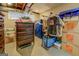 Basement with dresser, organized storage containers, and hanging clothes rack at 3449 Archwood Dr, Doraville, GA 30340