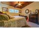 Bedroom with wooden ceiling, dresser, mirror, and windows at 3449 Archwood Dr, Doraville, GA 30340