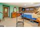 Finished basement bedroom features exposed brick fireplace and a calming color scheme at 3449 Archwood Dr, Doraville, GA 30340