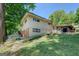 Side exterior of home with walk down to backyard area at 3449 Archwood Dr, Doraville, GA 30340