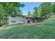 Back exterior of the home with back patio at 3449 Archwood Dr, Doraville, GA 30340