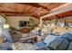 Comfortable living room featuring a ceiling fan and large windows that flood the space with natural light at 3449 Archwood Dr, Doraville, GA 30340