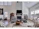 Bright living room with vaulted ceiling, stylish decor, and a cozy fireplace at 1721 Mcgarity Rd, Temple, GA 30179