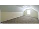 Finished attic space with carpeting, a window, and recessed lighting at 416 Clarion Dr, Carrollton, GA 30116