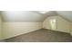 Finished attic space with carpeting, a window, and recessed lighting at 416 Clarion Dr, Carrollton, GA 30116