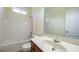 Bright bathroom with a tub and shower combination and a single sink vanity at 416 Clarion Dr, Carrollton, GA 30116