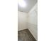 Walk-in closet with metal shelving, providing ample storage space at 416 Clarion Dr, Carrollton, GA 30116