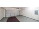 Spacious garage with sealed floors, door opener, and ample lighting at 416 Clarion Dr, Carrollton, GA 30116