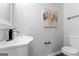Modern bathroom with stylish vanity, updated fixtures, and elegant wall art at 985 Columbia Dr, Decatur, GA 30030