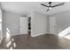 Spacious bedroom featuring hardwood floors and modern ceiling fan, offering a serene and comfortable living space at 985 Columbia Dr, Decatur, GA 30030