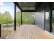 View of a spacious back deck with black railings and a sliding glass door at 104 Meldon Se Ave, Atlanta, GA 30315