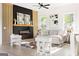 Bright living room features modern fireplace with stylish decor and plush seating, illuminated by natural light at 104 Meldon Se Ave, Atlanta, GA 30315