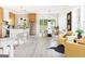 Open-concept living space with modern finishes, including light wood floors, a stylish kitchen, and a dining area at 104 Meldon Se Ave, Atlanta, GA 30315