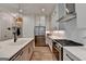 Bright kitchen featuring stainless steel appliances, modern cabinetry, and open layout at 1006 Fendley St, Woodstock, GA 30188