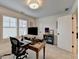 Cozy office showcasing a wooden desk with modern computer setup at 1006 Fendley St, Woodstock, GA 30188