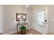 Inviting entryway featuring a console table with lamps and a decorative mirror at 100 Maple Leaf Rd, Sharpsburg, GA 30277