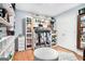 Walk-in closet with custom shelving for clothes, shoes, handbags, and accessories at 1211 Fly Rod Ln, Loganville, GA 30052