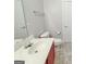 A full bathroom with wood cabinets at 161 Pleasant Grove Rd, Mcdonough, GA 30252