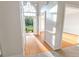 Elegant foyer with hardwood floors, beautiful arch window, and bright lighting at 161 Pleasant Grove Rd, Mcdonough, GA 30252