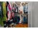 Walk-in closet with ample shelving and hanging space for optimal storage and organization at 207 Brookstone Dr, Carrollton, GA 30116