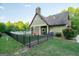 Community clubhouse featuring an outdoor seating area, stone fireplace, and playground at 207 Brookstone Dr, Carrollton, GA 30116