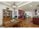 Elegant dining area blending with the kitchen featuring hardwood floors at 207 Brookstone Dr, Carrollton, GA 30116