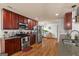 Well-equipped kitchen with stainless steel appliances, granite countertops, and ample storage at 207 Brookstone Dr, Carrollton, GA 30116