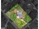Aerial view showcasing the home's placement on a lot with mature trees and lush landscaping at 30 Stonewall Dr, Covington, GA 30016