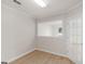 Bright basement with hardwood floors, a french door, and a view to another room at 30 Stonewall Dr, Covington, GA 30016