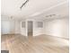 Spacious basement area with light hardwood flooring and recessed lighting at 30 Stonewall Dr, Covington, GA 30016