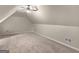 Bedroom featuring angled ceilings and carpet flooring with multiple air vents at 30 Stonewall Dr, Covington, GA 30016