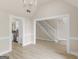 View of dining room, showcasing access to the kitchen and staircase, highlighting its central location at 30 Stonewall Dr, Covington, GA 30016