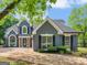 Beautiful two-story home with a well-manicured yard and a grand entrance at 30 Stonewall Dr, Covington, GA 30016