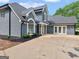 Beautiful two-story home with a well-manicured yard and a grand entrance at 30 Stonewall Dr, Covington, GA 30016
