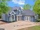 Beautiful two-story home with a well-manicured yard and a grand entrance at 30 Stonewall Dr, Covington, GA 30016