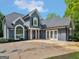 Beautiful two-story home with a well-manicured yard and a grand entrance at 30 Stonewall Dr, Covington, GA 30016