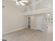 Bright and airy living room with wood flooring and a ceiling fan that adds a modern touch at 30 Stonewall Dr, Covington, GA 30016