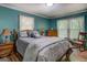 Serene bedroom with soft natural light, cozy furnishings, and ample closet space at 357 Oak Hill Rd, Covington, GA 30016