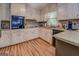 Cozy kitchen featuring ample cabinetry, granite countertops, and modern appliances at 357 Oak Hill Rd, Covington, GA 30016