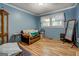Living room area with a window for natural light and comfortable seating at 357 Oak Hill Rd, Covington, GA 30016