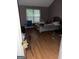 A view into the bedroom with hardwood floors at 4752 Browns Mill Ferry, Lithonia, GA 30038