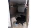Garage with a stain in the middle of the floor at 4752 Browns Mill Ferry, Lithonia, GA 30038