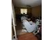 View of the living room with ceiling fan and exterior light at 4752 Browns Mill Ferry, Lithonia, GA 30038